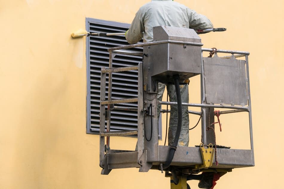 Grúa para pintar fachada
